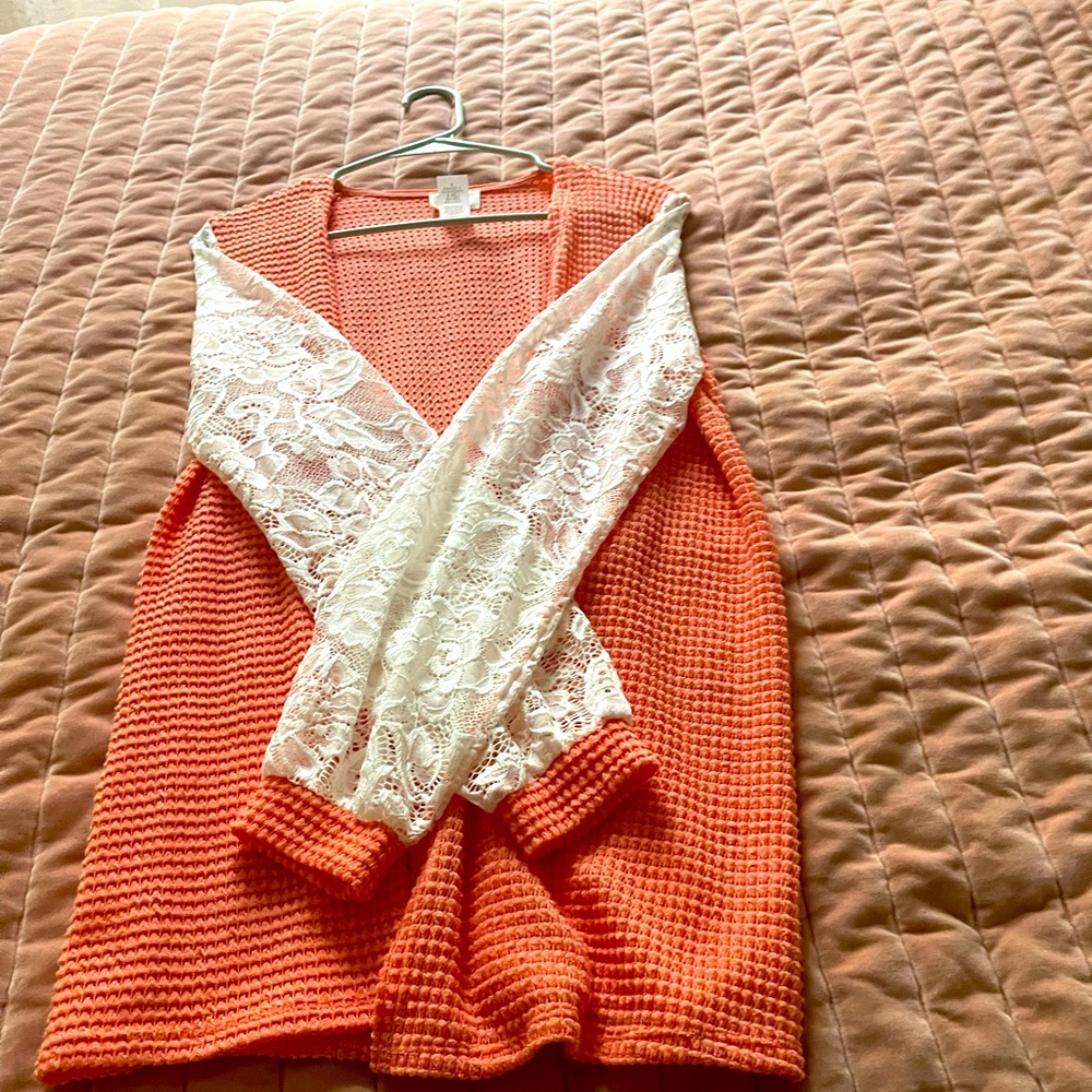 New, never worn coral cardigan w lace sleeves.